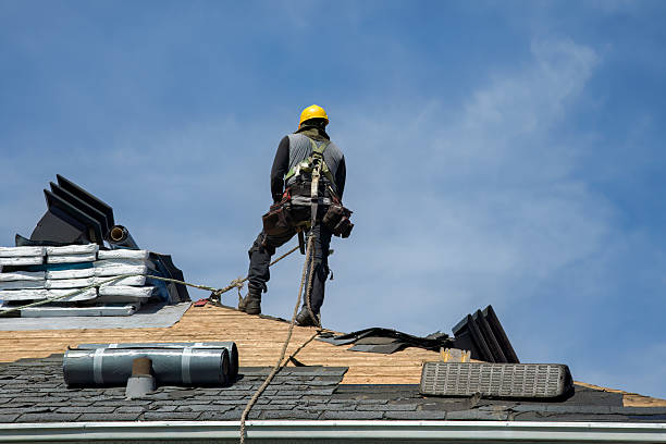 Professional Roofing technician working in Coupland, TX